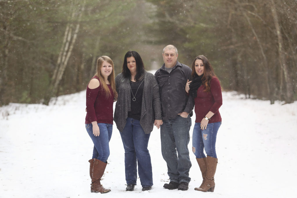 Linda from Linda Grant Photography is second from the left. On the outer sides are her two beautiful daughters, and to her left, her handsome husband.